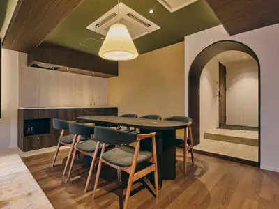 a dining room with a table and chairs at illi Eme Tokyo-Toranomon in Tokyo