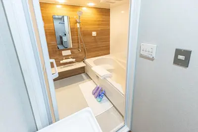 a small bathroom with a toilet and a sink at Sunny hotel 2 min walk to Iriya Station Direct to Ueno and Asakusa in Tokyo