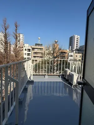 a view of a pool from a balcony at The Asakusa Townhouse in Tokyo