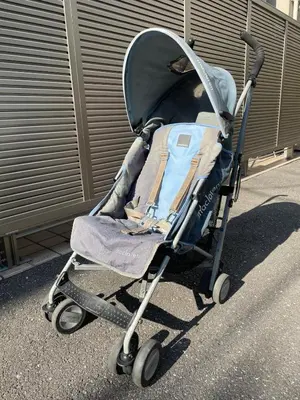 a blue baby stroller sitting on the street at SELENTE-S6 - Tokyo Tower 2BR - Central Tokyo in Tokyo