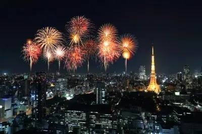 a city skyline with fireworks with the eiffel tower at SELENTE-S6 - Tokyo Tower 2BR - Central Tokyo in Tokyo