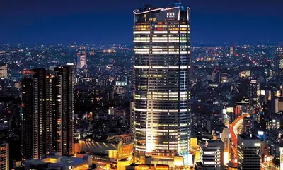 a view of a tall building in a city at night at SELENTE-S6 - Tokyo Tower 2BR - Central Tokyo in Tokyo