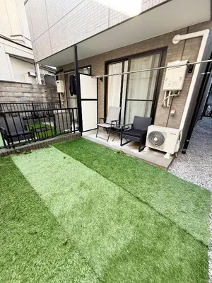 a patio with green grass on a house at IITaito area,3 people,3-minute to station, 2-tatami beds,family type in Tokyo