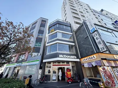 a store on a street with tall buildings at SIMMONS Brand beds,3 mins walk to station,,Ueno area,Direct to Akihabara 8 mins,Ginza 24 mins in Tokyo