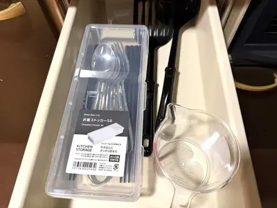 a plastic container with utensils on a counter at Yama Hotel Tsukiji in Tokyo