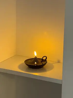 a candle sitting on top of a table at Joyful inn in Tokyo