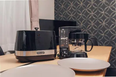 a toaster and a coffee maker on a table at 2BR Tokyo House easy Access to Asakusa 8ppl in Tokyo