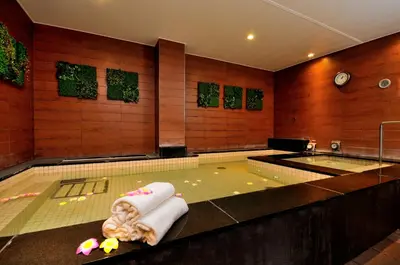 a bathroom with a pool with at Spa&Capsule Hotel Grandpark Inn Kitasenju in Tokyo