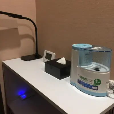 a desk in a room with a box on it at Tokyo Ariake Bay Hotel in Tokyo
