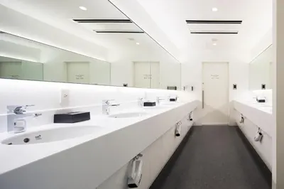a white bathroom with sinks and mirrors at Tokyo Ariake Bay Hotel in Tokyo