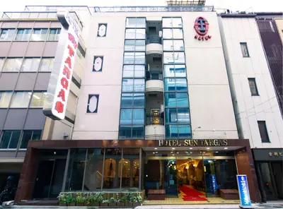 a store front of a hotel in a city at Hotel Suntargas Ueno in Tokyo