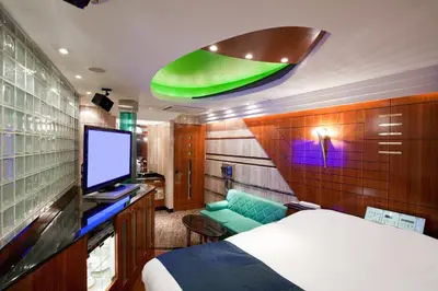 a bedroom with a bed and a tv in a room at HOTEL & SPA J-MEX Shinjuku Kabukicho (Adult Only) in Tokyo