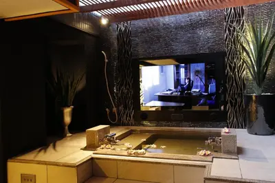 a bathroom with a sink and a mirror at Hotel Moana Shinjuku (Adult Only) in Tokyo