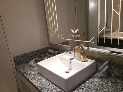 a white sink in a bathroom with a mirror at Hotel Moana Otsuka (Adult Only) in Tokyo