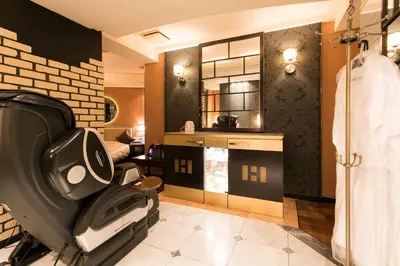 a bathroom with a hair dryer in a room at HOTEL PAL Otsuka -Adult Only- in Tokyo