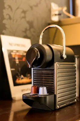 a small radio sitting on top of a table at HOTEL PAL Otsuka -Adult Only- in Tokyo