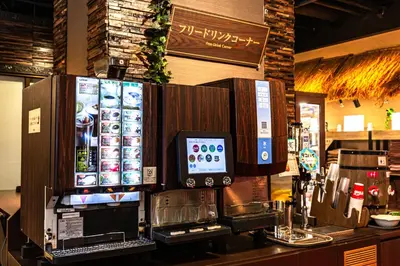 a counter in a restaurant with a counter top with aperature at Hotel Balian Resort Kinshicho in Tokyo