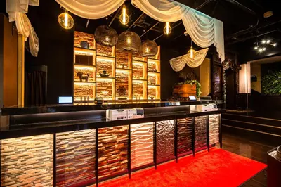 a bar with a red carpet in a restaurant at Hotel Balian Resort Kinshicho in Tokyo