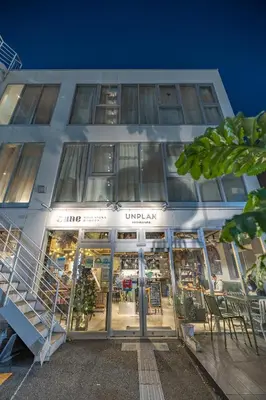 a building with an entrance to a store at UNPLAN Kagurazaka in Tokyo