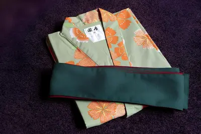 a pair of ties sitting on top of a table at NADESHIKO HOTEL TOKYO Shibuya by unito Female-only in Tokyo