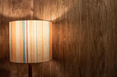 a lamp hanging on a wooden wall at Araiya Tokyo -Private Townhouse- in Tokyo
