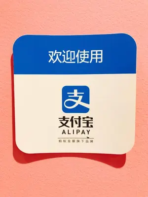 a blue and white parking sign on a wall at Akihabara Bay Hotel (Female Only) in Tokyo