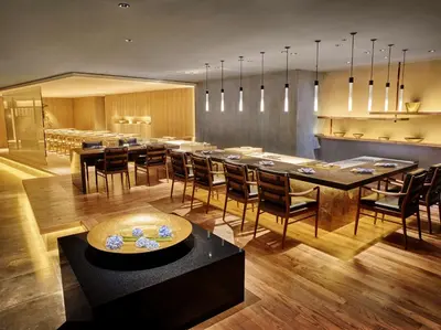 a large dining room with a large table and chairs at Hilton Tokyo Hotel in Tokyo