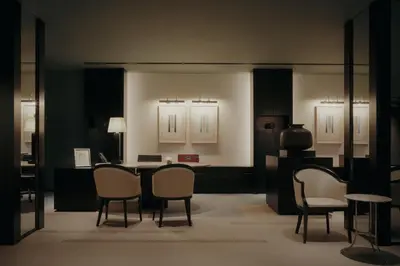a room with chairs and a table in a room at Park Hyatt Tokyo in Tokyo