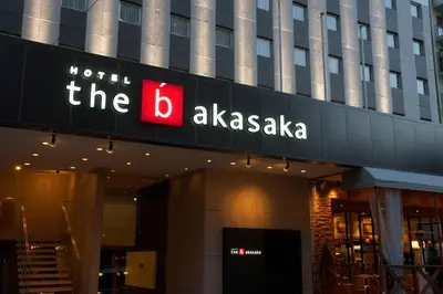 a building with a sign that reads the b alkasaki at the b akasaka in Tokyo