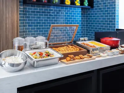 a buffet with different types of food on a counter at the b ochanomizu in Tokyo