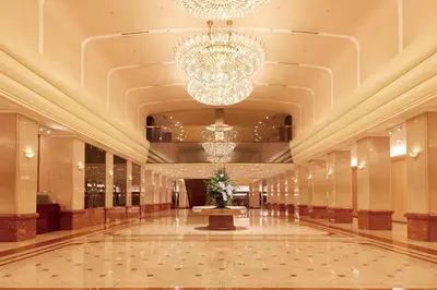 a lobby of a hotel with a chandelier at Keio Plaza Hotel Tokyo in Tokyo
