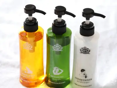 a group of three bottles sitting next to each other at APA Hotel Ochanomizu Ekikita in Tokyo