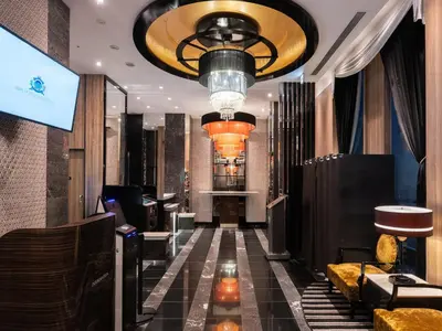 a lobby of a hotel with a large chandelier at APA Hotel Ochanomizu Ekikita in Tokyo