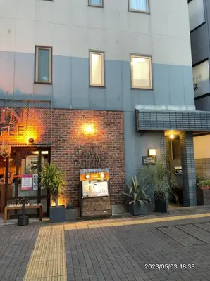 a facade of a building with a bakery on a street at Good Diner Inn Copain in Tokyo