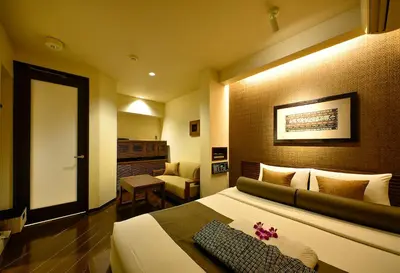 a hotel room with a bed and a couch at AROMA+ (Adult Only) in Tokyo