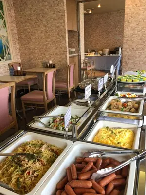 a buffet line with many different types of food at Urayasu Beaufort Hotel in Urayasu