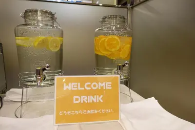 a sign in front of two mason jars filled with drinks at Urayasu Beaufort Hotel in Urayasu