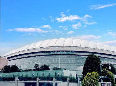 a large round building with a tony dmg sign on it at Hotel Trend Asakusa in Tokyo