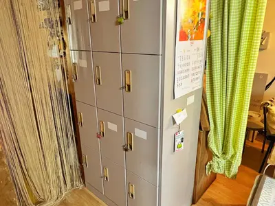 a locker with lockers in a room at Edo Tokyo Hostel in Tokyo