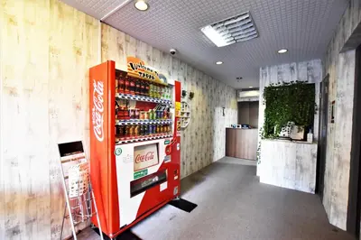 a coca cola vending machine in a room at Randor Residence Tokyo Classic in Tokyo