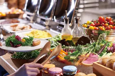 a table with a bunch of different types of food at remm Roppongi in Tokyo