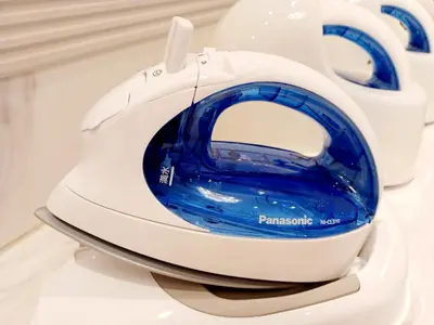 a blue and white toilet sitting on a shelf at Akasaka Urban Hotel in Tokyo