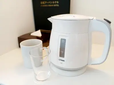a white mixer and two glasses on a counter at Akasaka Urban Hotel in Tokyo