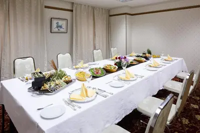 a long table with plates and food on it at Day Nice Hotel Tokyo in Tokyo