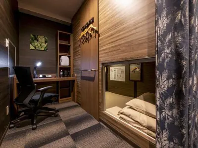 a home office with a desk and a chair in a room at Anshin oyado Tokyo Woman Ginza Shiodome in Tokyo