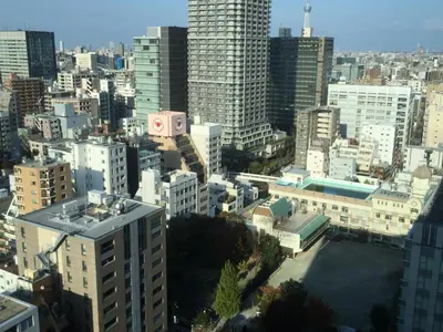 an aerial view of a city with tall buildings at City Pension Zem in Tokyo