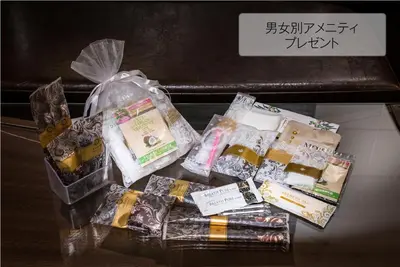 a pile of packaged food on top of a table at Hotel COREST (Adult Only) in Tokyo