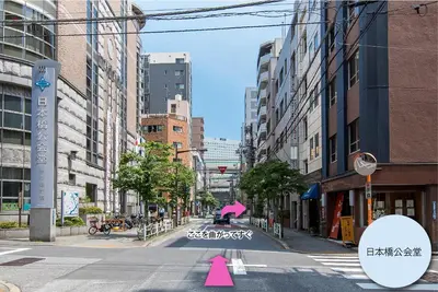 an empty city street with pink cones on the street at Hotel COREST (Adult Only) in Tokyo
