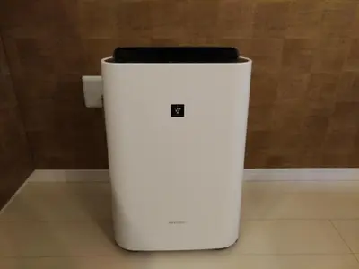 a white trash can sitting on the floor at Hotel Axas Nihonbashi in Tokyo