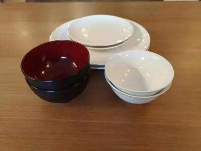 two bowls and plates sitting on a table at Hotel Axas Nihonbashi in Tokyo